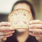 woman holding bread