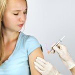 young girl gets vaccinated
