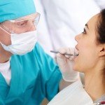 dentist-looking-at-woman