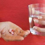 woman-taking-pills